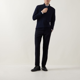 Model wearing Canali navy wool half zip jumper, styled with dark trousers and black leather shoes