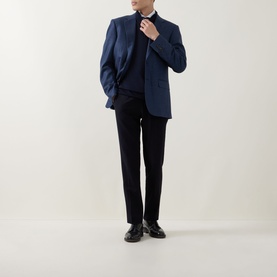 Model wearing Canali navy wool half zip, styled with matching navy blazer and black trousers with black leather shoes.