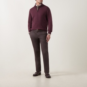 Model wearing Canali Burgundy Merino Half-Zip Sweater with grey trousers and dark brown leather shoes.