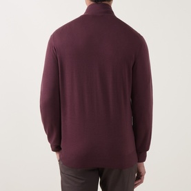 Model wearing Canali Merino Half-Zip Sweater in burgundy, rear view showing funnel neck and fine knit. Styled with grey trousers.