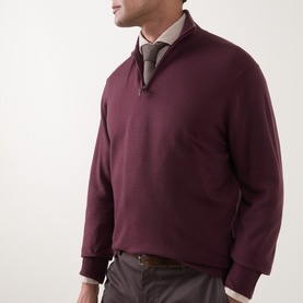 Model wearing Canali Burgundy Merino Half-Zip Sweater with funnel neck, styled with a collared shirt and grey trousers.