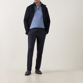 Model wearing Canali Merino Half-Zip Sweater in light blue, styled with navy jacket and tailored trousers, dark leather shoes.