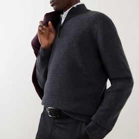 Model wearing Canali charcoal wool-cashmere half zip jumper, styled with dark trousers and a black leather belt.