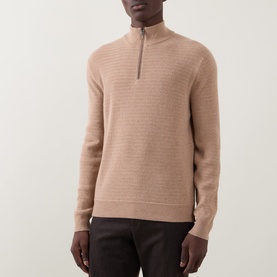 Model wearing Canali camel wool-cashmere half-zip knit, styled with dark brown trousers.