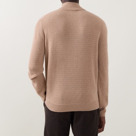 Model wearing Canali camel wool-cashmere half zip jumper, back view, styled with dark brown trousers.