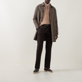 Model wearing Canali camel wool-cashmere half zip, styled with a taupe overcoat, dark trousers and navy loafers.