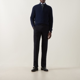 Model wearing Canali navy wool-cashmere half zip jumper, styled with dark tailored trousers, striped tie and black leather shoes.