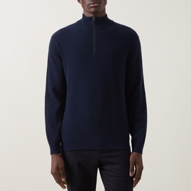 Model wearing Canali navy wool-cashmere half-zip knit with ribbed texture, styled with dark trousers.