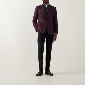 Model wearing Canali burgundy wool-silk blend jacket with black trousers, grey shirt, and dark loafers.