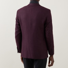 Model wearing Canali burgundy wool and silk blazer jacket, rear view, styled with black trousers