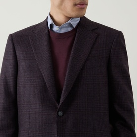 Model wearing Canali D6 Check Single-Breasted Blazer in burgundy tonal check, styled with a burgundy knit and blue gingham shirt.