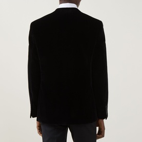Model wearing Canali D6 Velvet Single-Breasted Suit Jacket in black, rear view, paired with white dress shirt.