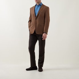 Model wearing Canali Flannel Single-Breasted Blazer in camel with notch lapel, styled with blue shirt and dark trousers.