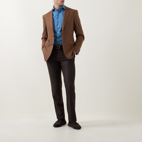 Model wearing Canali Flannel Single-Breasted Blazer in camel with blue shirt and dark trousers
