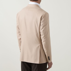 Model wearing Canali D8 Double-Breasted Blazer in Navy, rear view showing double vent, buttoned cuffs, styled with dark trousers and white shirt.