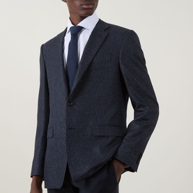 Model wearing Canali D8 Mini Check Single-Breasted Suit Jacket in navy wool, styled with white shirt and navy tie