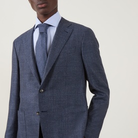 Model wearing Canali D7 Kai Single-Breasted Suit Jacket in blue houndstooth wool blend, styled with light blue shirt and grey tie