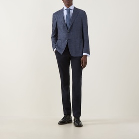 Model wearing Canali D7 Kai Single-Breasted Suit Jacket in blue, styled with navy trousers, white shirt, and black leather shoes