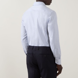 Model wearing Canali Broken Check Single-Cuff Shirt in blue cotton, rear view, styled with navy tailored trousers.