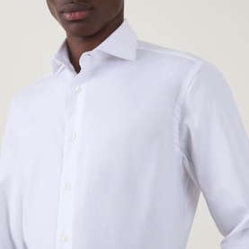 Model wearing Canali Pinpoint Single Cuff Shirt in white, featuring a pointed collar and button fastenings, close-up detail shot.