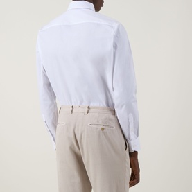 Model wearing Canali Travel Stretch Single-Cuff Shirt in white, rear view, styled with stone chinos