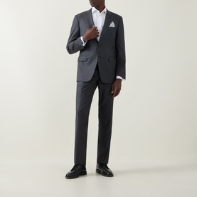 Model wearing Canali Drop 6 Griz Two-Piece Suit in grey wool, styled with white shirt, pocket square, and black dress shoes.