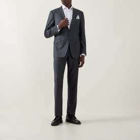 Model wearing Canali Drop 6 Griz Two-Piece Suit in grey wool, styled with white shirt, pocket square, and black dress shoes