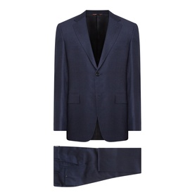 Canali dark blue wool suit with notch lapels, single-button jacket, and slim-fit trousers, displayed flat