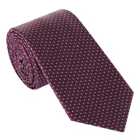 Navy and red micro-pattern silk tie, rolled to show texture, with small geometric dot weave detail throughout