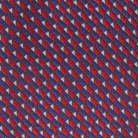 Navy and red geometric patterned silk tie with repeating diagonal woven motif in red, navy and white