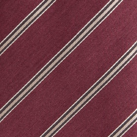 Canali burgundy silk-wool blend tie with diagonal cream and navy regimental stripes, close-up texture detail