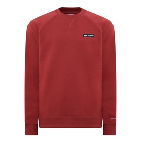Columbia crew neck sweatshirt in Red Oxide, small chest logo patch, raglan sleeves, ribbed cuffs and hem