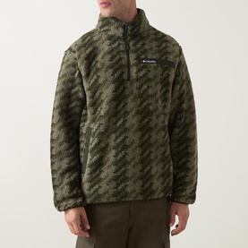 Model wearing Columbia Helvetia&trade; II Printed Half Snap Fleece in Stone Green Twills with houndstooth pattern, half-zip neck, and elasticated cuffs