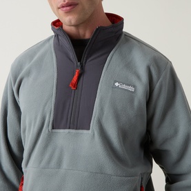 Model wearing Columbia Sequoia Grove II Half Zip Fleece Jacket in Sedona Sage/Shark, showing colour-block detail and half-zip neckline.