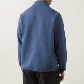 Model wearing Columbia Sweater Weather II Fleece Jacket in Dark Mountain blue, rear view showing half-zip fastening and elasticated hem.