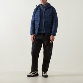 Model wearing Columbia Sweater Weather&trade; II Fleece Jacket in Dark Mountain navy, styled with black trousers and trail trainers.