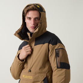 Model wearing Columbia Challenger&trade; II Pullover Anorak in Delta/Black, colour block anorak with fixed hood and half-zip placket, sleeve zip pocket