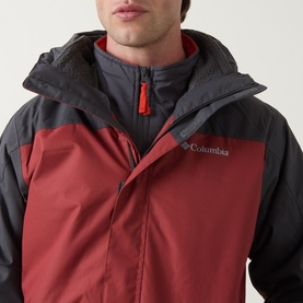 Model wearing Columbia Hikebound&trade; II 3-in-1 Waterproof Jacket in Red Oxide and Shark, showing colour block design and fixed hood close-up