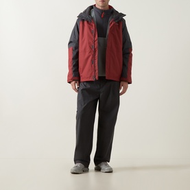 Model wearing Columbia Hikebound&trade; II 3-in-1 Waterproof Jacket in Red Oxide and Shark, styled with black trousers and grey shoes.