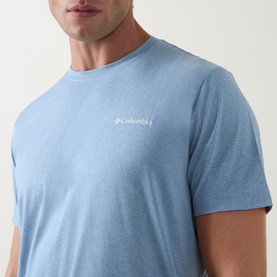 Model wearing Columbia Parons Logo Back Graphic T-Shirt in Rainy Day Heather, close-up showing chest logo and round neck detail.