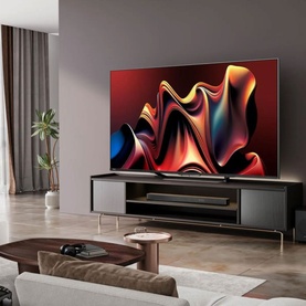 Hisense 65 Inch U7Q Mini QLED 4K Smart TV in black, displayed in a modern living room on a TV unit with soundbar below.