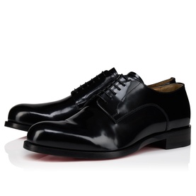 Christian Louboutin black polished leather Oxford shoes with lace-up front, tan leather lining, and signature red sole.