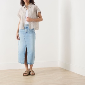 Model wearing Marc O Polo Light Beige Multi cotton blouse, styled with light blue denim midi skirt and tan sandals