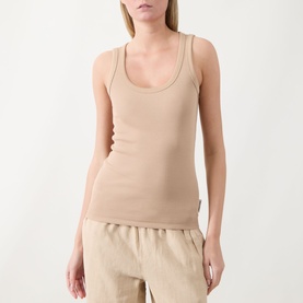 Model wearing Marc O Polo Solid Logo Tank Top in Sandpaper, ribbed sleeveless style with scoop neckline, styled with matching linen trousers.