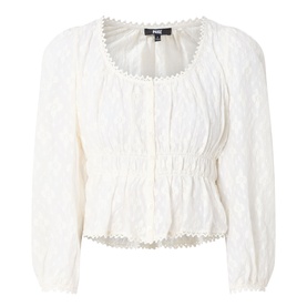 Paige Jay Embroidered Blouse in Antique White with square neckline, elasticated waist, ruffled hem, and long sleeves