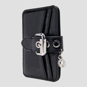 Maje black patent leather cardholder wallet with silver buckle and logo charm detail, strap fastening