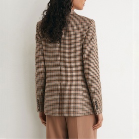 Model wearing Reiss neutral check blazer, rear view, styled with camel wide-leg trousers and white high-neck top
