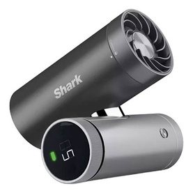 Shark branded portable air purifier in dark grey, cylindrical design with fan grille and LED indicator, shown at angle