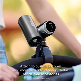 Shark ChillPill portable fan in dark grey attached to a bike handlebar, shown in outdoor lifestyle setting
