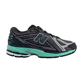 New Balance trainer in black metallic deep end with mint green sole, silver mesh upper, and signature N logo on side.
